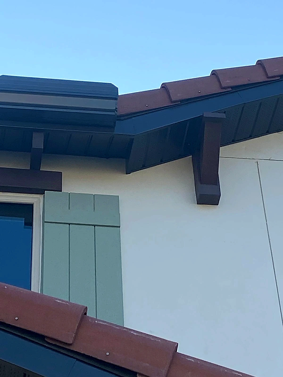 Dark fascia and roof trim installation